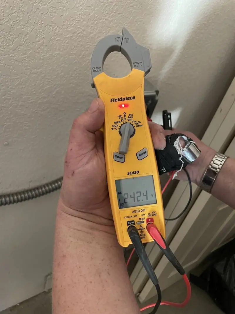 Voltage testing with clamp meter during Electrical Installation Services in Verde Village